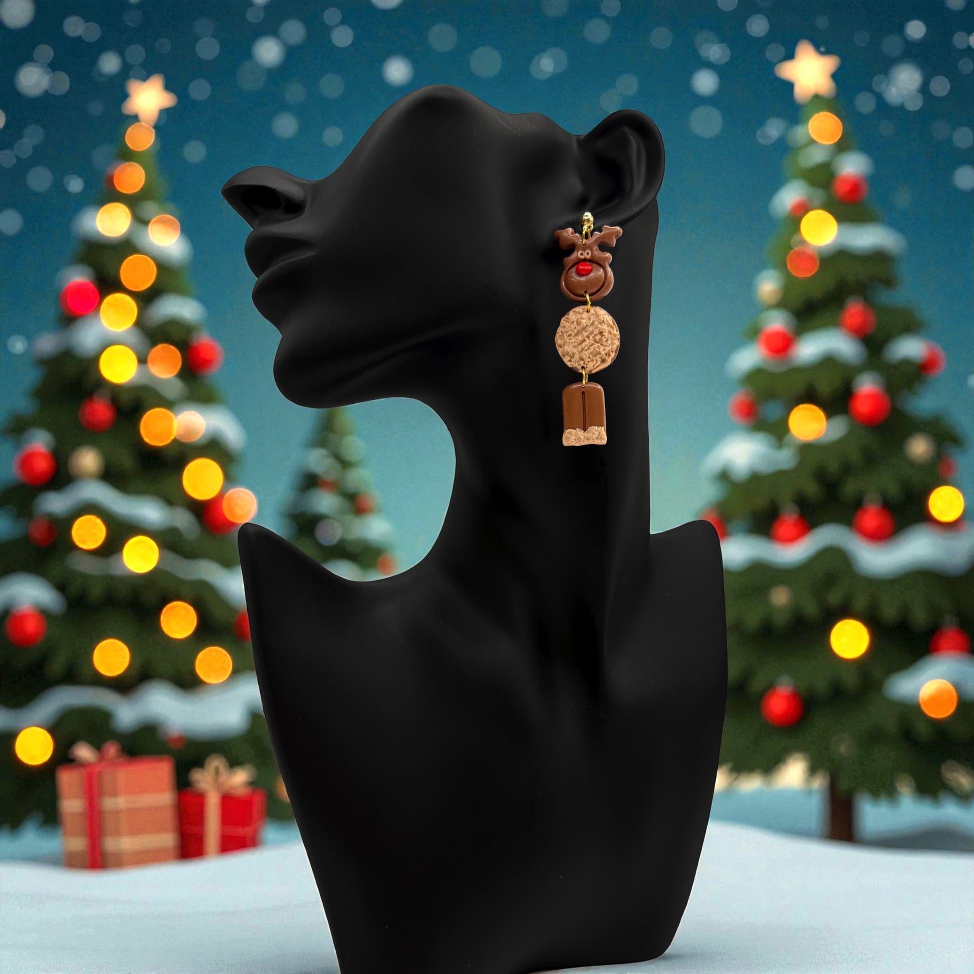 Christmas Reindeer earring on a black mannequin with a festive background including Christmas trees, snow and presents.