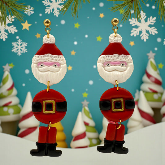 Santa Claus earrings with a festive background featuring Christmas trees and snowflakes.