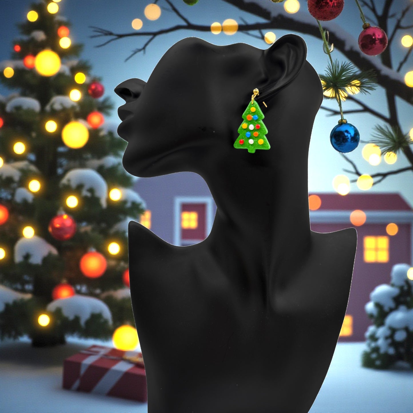 Christmas Tree earrings from These pretty Things on a black mannequin bust with a festive background.