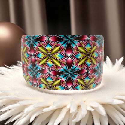 These Pretty Thiings Millefiori Cuff nestled on a beige feather boa with a 1920's themed background