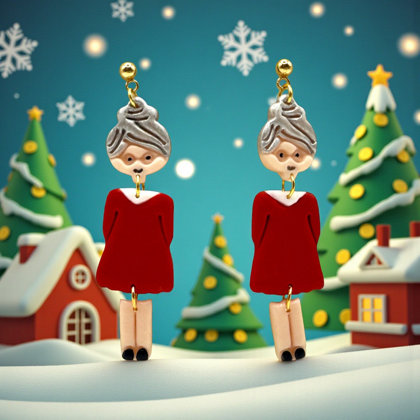 Festive Mrs Christmas in a red dress with silver hair earrings with a Christmas village background featuring snow covered chalets and Christmas trees